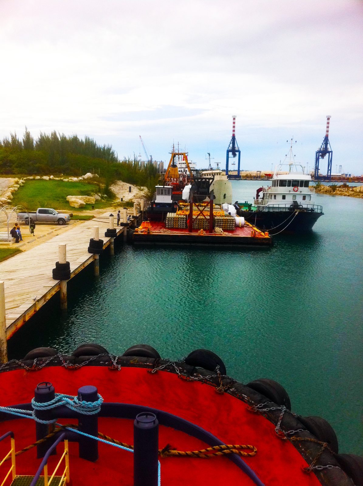Tug alongside a work barge