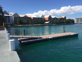 Floating dock in front of a resort